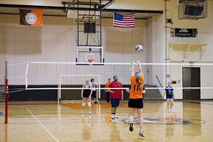 Students playing volleyball
